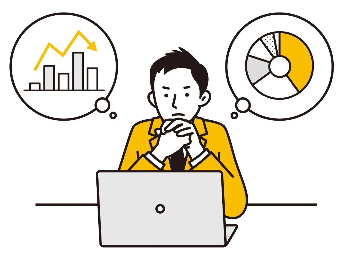 ビジネスマンがPC画面でウェブサイト分析データを見ている