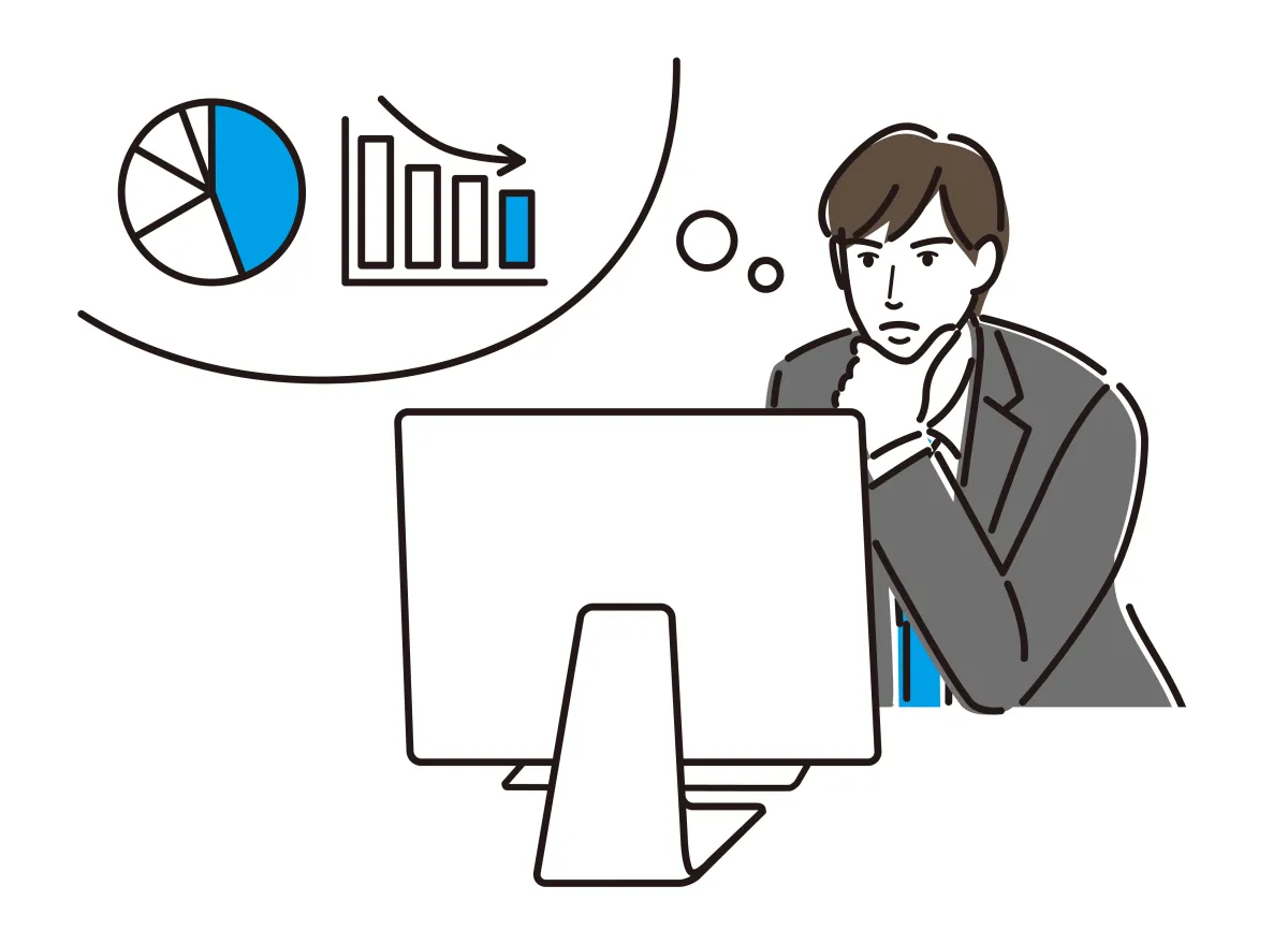 ノートパソコンとモニターでデータ分析をするビジネスマン
